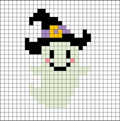 a cross stitch pattern with a pumpkin wearing a witch's hat on top of it