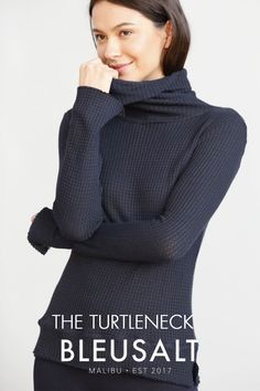 This seasonless basic, worn on its own or as a layering piece, perfectly moves with you through the seasons. Fitted Fine Knit Turtleneck, Fitted Fine Knit High Neck Turtleneck, High Neck Turtleneck With Thumbholes For Layering, Turtleneck With Thumbholes For Layering, Fitted Fine Knit Turtleneck For Layering, Winter Mock Neck Top With Thumbholes, Winter Funnel Neck Turtleneck With Thumbholes, Chic Fitted Turtleneck With Thumbholes, Classic Fitted Funnel Neck Turtleneck