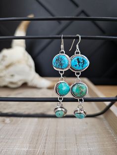 Sterling Silver Three Turquoise Stone Dangle Earrings Native American Made by Edward Johnson Stamped EJ Measures 2 7/8" Long Including Hook Turquoise Dangle Jewelry, Turquoise Dangle Earrings With Natural Stones, Southwestern Turquoise Drop Earrings, Earrings Native American, Turquoise Dangle Earrings, Stone Dangle Earrings, Turquoise Earrings Dangle, American Made, Turquoise Stone