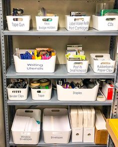 the shelves have bins with different types of items on them, and labeled labels