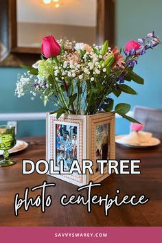 a vase filled with flowers sitting on top of a wooden table