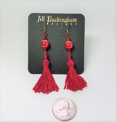 Earrings made of  red glass Swarovski pearls red Swarovski crystals red fiber tassels goldplate accents goldplate French hook earwires Handmade, one-of-a-kind Free gift box included Red Tasseled Jewelry As A Gift, Red Tasseled Jewelry For Gift, Elegant Red Tassel Drop Earrings, Elegant Red Tassel Earrings As Gift, Elegant Red Tassel Earrings For Gift, Handmade Red Tassel Earrings, Elegant Style, Handmade Elegant Red Tassel Earrings, Elegant Handmade Red Tassel Earrings, Elegant Red Handmade Tassel Earrings