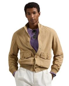 To create this layer, Polo updated a sporting-inspired silhouette that was based on an archival Ralph Lauren jacket with lightweight suede. Fall Outfits For Men, Kunal Rawal, Denim Polo, Ralph Lauren Jacket, Chic Fall Outfits, Safari Jacket, Rugged Look, Ralph Lauren Purple Label, Polo Sport