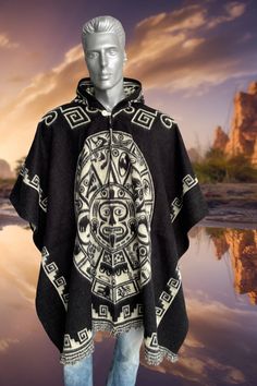 Handmade Poncho - soft, light, warm and feels very pleasant to the skin Luxurious wool poncho with symbols of the Incas Indulge in the luxurious comfort of our handcrafted Hooded Poncho of Wool in Black. Designed with a traditional Aztec Maya calendar pattern and a hood for added warmth. Made from soft and breathable wool, it's perfect for mild weather and outdoor adventures.  One Size approx. 37 inch length / 47 inch width approx. 95 cm length / 121 cm width The mannequin in the photos is 73 in Tracking Money, Handmade Poncho, Maya Calendar, Poncho With Hood, Alpaca Poncho, Cold Autumn, Wool Poncho, Hooded Poncho, Native Design