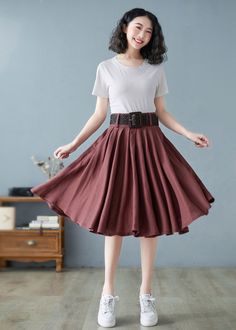 "★★ FEATURES * 100% Linen * Two side seam pockets * Right hidden zipper closure * with belt loop * Pleated skirt * A Line Skirt * Perfect for Spring, Summer, Autumn * Wash by hand or machine with cold water ★★ The model is 165 cm (5′ 5″) tall with a 80 cm (31.5\") bust, 66 cm (26\") waist. She is wearing the brown linen skirt in size XS. ★★ Bespoke Order Service If you Request other color Request the length Your height is not between 155 cm- 172 cm Your weight is over 75 kg I can do it for you, Non-stretch Brown Cotton Skirt, Belted Brown Skirt, Belted Skirt For Summer, Non-stretch Long Brown Skirt, Non-stretch Brown Long Skirt, Brown Non-stretch Midi Skirt, Brown Non-stretch Flared Skirt, Casual Brown Belted Skirt, Spring Belted Skirt