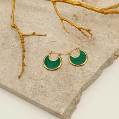 USE CODE THE FOLLOWING CODE TO RECIEVE 15% OFF: UGCARTISTRY15. Like hanging golden discs designed with green lovely patterns, these sculptural statement hoops are the simplest way to refresh your staples. Plating: 14k Gold Materials: 14K Gold on Copper, Green Aventurine Measurements: 18 cm Hypoallergenic Modern Green Round Earrings, Green Gold Plated Round Earrings, Green Round Gold-plated Earrings, Green Gold-plated Round Earrings, Green Tarnish Resistant Hoop Earrings For Gift, Green Tarnish Resistant Round Jewelry, Tarnish Resistant Green Round Jewelry, Everyday Green Circular Earrings, Chic Handmade Green Jewelry