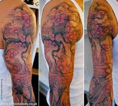 this is an image of a man's arm with flowers on it and a tree in the background