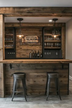 a wooden bar with two stools next to it