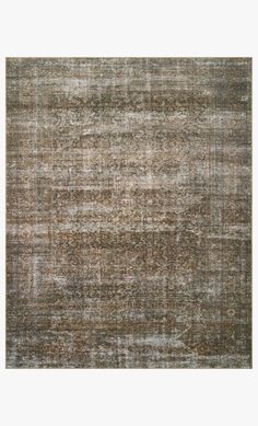 an area rug with different colors and patterns on the carpet, including browns and creams