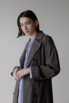 Information The Leora Coat is a minimalist timeless staple that will instantly refine your look. This lightweight double-breasted trench coat features a partial back lining for comfortability, side pockets and adjustable sleeves in an oversized fit. Details Self: 50% Cotton, 50% Rayon Lining: 100% Polyester Double Brea Double Breasted Trench Coat, Charcoal Color, Oversized Fits, Double Breasted, Winter Fashion, Trench Coat, Womens Sizes