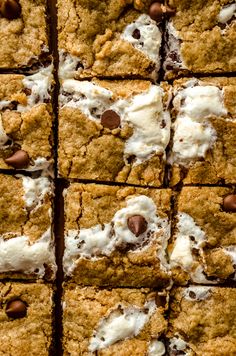 chocolate chip cookie bars with marshmallows and chocolate chips on top, cut into squares