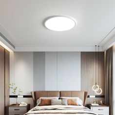 a bedroom with a bed, nightstands and lamps