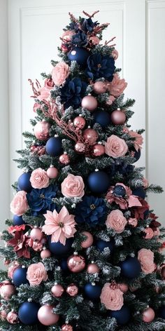 Bring the holiday spirit to your home with these stunning Christmas tree ideas! Discover unique decorating styles that suit every theme, from rustic charm to modern elegance. #ChristmasDecor #TreeInspiration #HolidayDecor #FestiveIdeas #XmasDecor Navy Blue Xmas Decor, Christmas Tree Blue And Pink, Pink And Navy Blue Christmas Tree, Navy Blue And Pink Christmas Tree, Pink And Blue Christmas Tree Decorations, Navy And Pink Christmas Tree, Navy Blue Christmas Tree Decorations, Pink And Blue Christmas Decorations, Blue Pink Christmas Tree