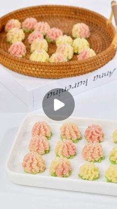 there is a tray with some food on it next to a basket full of cookies