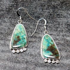 "Turquoise polygon shaped dangle earrings by Navajo artist Samuel Yellowhair. Earrings have a hanging length of 1 5/8"", are 3/4"" wide and weigh approximately 11 grams for the pair." Turquoise Long Drop Earrings With Ear Wire, Southwestern Turquoise Drop Earrings, Artisan Turquoise Pierced Earrings, Turquoise Teardrop Chandelier Earrings In Sterling Silver, Turquoise Long Drop Sterling Silver Earrings, Turquoise Sterling Silver Long Drop Earrings, Southwestern Turquoise Jewelry With Ear Wire, Unique Turquoise Teardrop Earrings, Turquoise Dangle Earrings