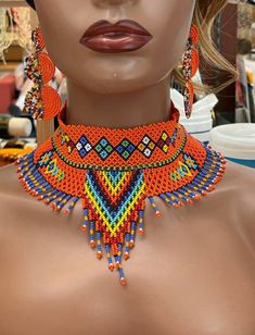 This thick necklace is made of fine multilayer beads wound together. It is very comfortable to wear and stays put around the neck. The beads are very bright and beautiful.  Contact owner for any personalization. Thanks for vising my shop and come again. Stay safe https://www.etsy.com/shop/naistumityujewelry Thick Necklace, African Necklace, Beaded Necklace Diy, Cloth Flowers, Round Necklace, Bright And Beautiful, White Necklace, Seed Bead Jewelry, Diy Necklace