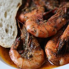 some shrimp and bread are in a bowl