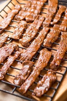 the meat is cooking on the grill and ready to be grilled into barbecues