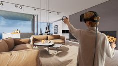 a person in a living room with a virtual reality headset on their head, looking out the window