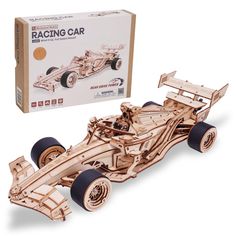 a wooden model of a racing car