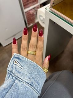 Not your average Christmas nails! From frosty tips to Santa-approved sparkle, these designs are the definition of holiday glam! Cherry Burgundy Nails, Cherry Cola Red Nails, All Red Acrylic Nails, Cherry Red Fall Nails, Red Almond Dip Nails, Red Wine Almond Nails, True Red Nails, Cheery Red Nail, Cherry Glazed Nails