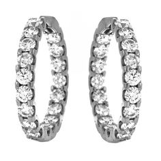 An elegant pair of inside/out style diamond hoop earrings featuring top quality brilliant diamonds prong-set in 18k White Gold. Total diamond weight 4.50 carats! Diamonds are F-G color and SI2 clarity. Stunning in every way, these earrings give just the right of sparkle to your look, whether for everyday casual wear, a night out, or a special date. ---Details--- * Natural Round Diamonds * Color: F-G * Clarity: SI2 * Weight: 4.50 carats total weight Metal: 18k White Gold Every treasure comes with Gold Anniversary, White Gold Set, Gift Ideas For Her, Yellow Earrings, Diamond Hoop Earrings, Fine Jewels, Christmas Gift Ideas, Gifts Christmas, Luxury Gifts