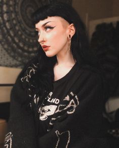 Bold Goth Hair Cut Ideas 2023 Black Hair Shaved Sides, Goth Mullet Shaved Sides, Shaved Sideburns Women, Shaved Sides Long Hair, Goth Haircuts