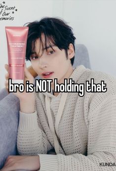 a person sitting on a couch holding up a tube of sunscreen and the words bro is not holding that