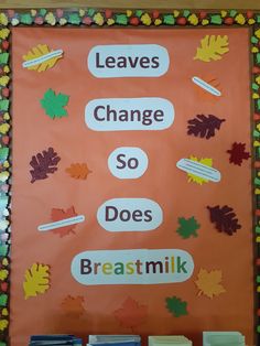 a bulletin board with leaves and words on it