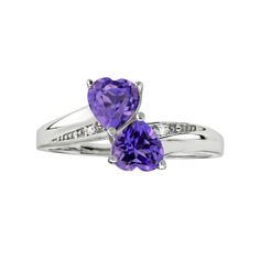 Shimmering heart-cut amethyst stones make this sterling silver bypass ring a lovely choice. RING DETAILS     Width: .39 in.     Metal: sterling silver    Plating: rhodium STONE DETAILS     Stone type: amethyst     Total weight: 3/4 ct.     Shape: heart     Setting: prong DIAMOND DETAILS     Total weight: less than 1/10 ct.     Shape: round     Setting: prong Gemstones may have been treated to enhance their appearance.  Special care may be required. Please visit our Gemstone Treatment & Special C Rings Purple, Pearl Diamond Jewelry, Amethyst Ring Vintage, Colorful Gemstones, Cross Jewelry Necklace, Fan Jewelry, Amethyst Ring Engagement, Purple Rings, Diamond Wedding Rings Sets