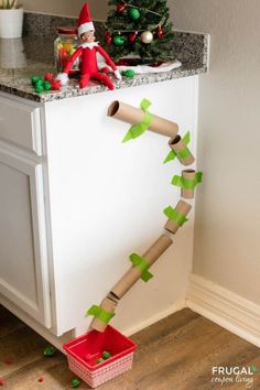 Quick and Easy, Funny Elf on the Shelf toddler idea. Elf on the Shelf toilet paper roll activity. Make your own DIY Toilet Paper Roll Marble Run. In this indoor kids activity, use cardboad tubes for a marble or pom-pom run the kids to do over and over New Elf on the Shelf ideas daily plus free Elf on the Shelf printables. #FrugalCouponLiving #ElfontheShelf #ElfontheShelfIdeas #ElfIdeas #funnyelfideas #funnyelfontheshelf #freeelfprintables #printables #freeprintables #ElfonaShelf #ScoutElfIdeas Napkin Folding Ideas, Thanksgiving Aesthetic, Paper Napkin Folding, Folding Ideas