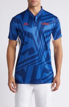 a man wearing a blue polo shirt with the usa in red and white on it