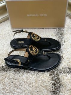 Michael Kors Women's Aubrey Charm Saffiano PVC Thong Sandal Black 49S9AUFA1L Luxury Michael Kors Sandals, Michael Kors Luxury Leather Sandals, Luxury Michael Kors Leather Sandals, Luxury Leather Michael Kors Sandals, Michael Kors Black Flat Sandals, Michael Kors Adjustable Open Toe Sandals, Michael Kors Sandals, Tory Burch Miller Sandal, Thong Sandals