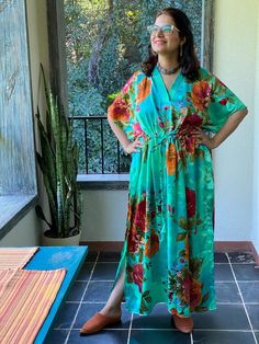 I made this Kaftan from a beautiful floral pattern in satin silk fabric. It is very soft with a nice flowy feel to it making you feel as if you are not wearing anything.It is so free flowing, that it will make you feel as if you aren't wearing anything at all ;)The beauty of the Kaftans is they will fit everyone so no need to worry about the size et all. All my Kaftans have deep necks(11-12 inches) so will fit all head sizes.However, the length of my kaftans will vary.I make all my kaftan styles Floral Print V-neck Free Size Kaftan, Silk Floral Print Floor-length Kaftan, Floral Embroidered Kaftan For Beach Cover-up, Pink Floral Print Kaftan For Beach Cover-up, Kaftan Styles, Silk Floral Print Kaftan For Beach Cover-up, Bridesmaid Pjs, Delivery Gown, New Mom Gift