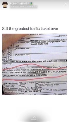 a person holding up a paper with the words, still the greatest traffic ticket ever