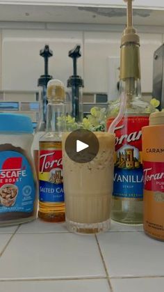 a counter top with various types of condiments on it