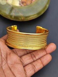 You will receive one Indian Art Handcrafted  Unique Gold Plated Brass Cuff Bangle Bracelet Vintage Style Exclusive Fashionable Bangle For Her.    Bangle Width  : 1" Approx.   Many thanks for you visit my store ♥ if you have any question please contact us. For wholesale Price Please Convo me. You can order different items as many you like . Ritual Bangle With Intricate Design In Brass, Ritual Bangle With Intricate Brass Design, Ceremonial Heavy Brass Bangle, Luxury Traditional Brass Bangle, Bohemian Brass Bangle, Brass Cuff, Cuff Bangle Bracelet, Bracelet Vintage, Cuff Bangles