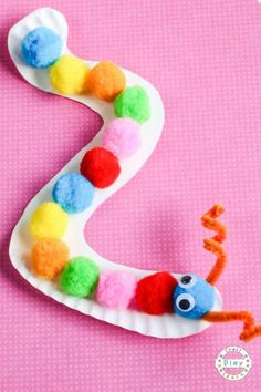 an easy paper plate caterpillar craft for kids to make with the letter s