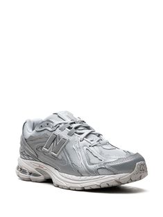 New Balance 1906D "Protection Pack - Silver Metallic" Sneakers - Farfetch Silver New Balance Lace-up Sneakers, Silver Lace-up New Balance Sneakers, Silver Sneakers With Rubber Sole For Light Sports, Classic Silver Running Shoes For Streetwear, Silver Low-top Sneakers With Rubber Sole, New Balance Silver Sports Sneakers, New Balance Silver Sneakers For Sports, Silver Sneakers With Air Cushioning For Light Sports, New Balance Low-top Sneakers With Reflective Details