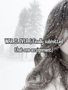 a girl with long hair and snow falling on her face is looking at the camera