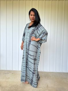 Unwind in absolute comfort with our semi sheer cotton gauze kaftan. This kaftan is perfect for the beach, pool, resort and laid-back time at home. Crafted from quality soft and breathable gauze cotton, it offers an airy fit that's ideal for lounging and cover up. Its relaxed design and easy slip-on style make it your go-to choice for outdoor cover up and relaxed nights at home. V-neck Maxi Dress With Natural Dye For Summer, Bohemian Flowy Unlined Cover-up, Flowy Bohemian Unlined Cover-up, Casual Summer Kimono With Natural Dye, Flowy Long Breezy Cover-up, Casual V-neck Relaxed Fit Kaftan, Flowy V-neck Kaftan For Poolside, Oversized Maxi Summer Cover-up, Casual Flowy Kaftan For Beach Season