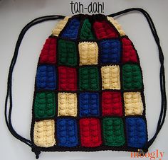 a crocheted bag made out of lego blocks