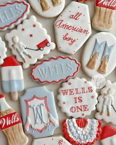 decorated cookies are displayed on a white surface