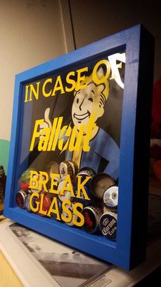 there is a blue framed sign that says in case of fail break glass on it