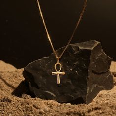 This solid gold key of Ankh necklace showcases exquisite craftsmanship, symbolizing life and spirituality. The key of Ankh pendant is more than just jewelry; it's a fine representation of ancient Egyptian elegance and the timeless allure of this sacred symbol. PENDANT INFORMATIONThis pendant is made of real, solid gold.• Made in USA• Material: 14k or 18k solid gold• Finish: polished• Height: 1.52" (38,5 mm) x Width: 0.88" (22 mm)• Pendant weight: approx. 6 grams (14k)• Bail: fits up to 4 mm chai Symbolic Yellow Gold Cross Jewelry, Symbolic Yellow Gold Cross Necklace, Traditional Gold Crucifix Jewelry, Elegant Ankh-shaped Hallmarked Necklace, 14k Gold Spiritual Cross Pendant Necklace, Spiritual 14k Gold Cross Pendant Necklace, Symbolic Gold Plated Necklace With Large Pendant, Symbolic Gold Plated Necklaces With Large Pendant, Hallmarked Yellow Gold Ankh Jewelry