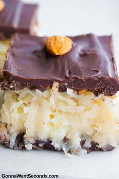 there are two pieces of chocolate and coconut bars