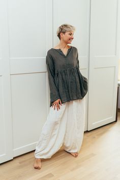 "Airy, light oversized linen shirt for hot summer days.  Made from pure light weight gauzy linen with great attention to details.  This boho cropped top will be ideal for layering and will look fantastic both with skirt as well as trousers. One size fits most.   The shirt measures 29\" [74cm] across bust. Front length 21.6\" [55cm] Rear length 27.15\" [69cm] Custom sized orders are also possible. Each piece is individually cut, sawn and pre-washed.  The more you'll wear and wash it the more the Summer Linen Long Sleeve Tops, Linen Lagenlook Tops For Daywear, Relaxed Fit Lagenlook Blouse For Beach, Relaxed Fit Ramie Blouse For Daywear, Oversized Long Sleeve Ramie Tops, Casual Ramie Tops For Daywear, Linen Lagenlook Tunic Top, Linen Tunic Top In Lagenlook Style, Oversized Linen Summer Tops