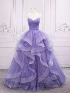 Lavender Sleeveless Party Gown, Sleeveless Lavender Gown For Party, Purple Sleeveless Dress With Tulle Skirt, Purple Sleeveless Tulle Evening Dress, Sleeveless Lavender Evening Dress For Prom, Purple Sleeveless Ruffled Gown, Sleeveless Tulle Ball Gown For Debutante Ball, Sleeveless Evening Dress For Quinceanera, Sleeveless Organza Ball Gown For Debutante Ball