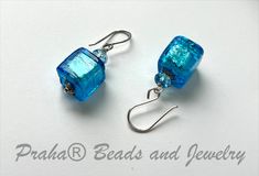 Perfect for any occasion. Simple, bright blue Murano glass square cubes drop from sterling silver ear wires. Swarovski crystals and rondells sit atop the beads. Blue Earrings With Spacer Beads For Gift, Blue Square Earrings For Gift, Praha Prague, Cube Earrings, Murano Glass Earrings, Glass Cube, Translucent Glass, Freshwater Pearls Earrings, Bead Store