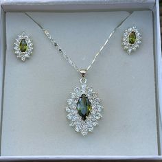 Lime Green Stone Encrusted In Faux Diamonds With Matching Stud Earrings Set, Marquis Cut Perfect For Any Formal Event! Chain Size: 10”, 20" Total Stone Size: 1” New In Box Want To See More Jewelry ?? Use The Funnel Icon At Top Right To Search: Women>Jewelry Silver Crystal Jewelry Set As Gift, Silver Crystal Jewelry Set For Gift, Silver Sterling Jewelry Set With Sparkling Stones, Sterling Silver Jewelry Sets With Sparkling Stones, Silver Cubic Zirconia Jewelry Set With Matching Earrings, Silver Crystal Jewelry With Matching Earrings, Silver Jewelry Sets With Matching Earrings For Anniversary, Silver Crystal Jewelry Sets With Matching Earrings, Sterling Silver Party Jewelry Sets With Matching Earrings